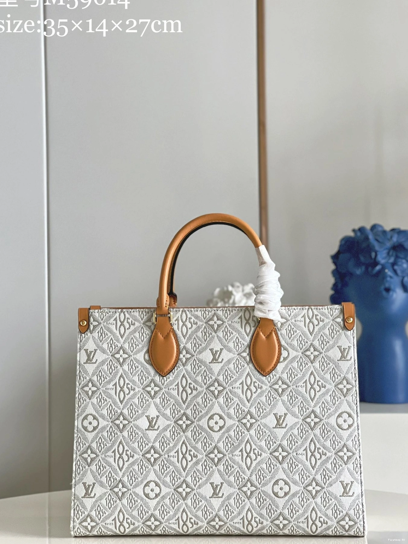 First bag LOUIS VUITTON MM ONTHEGO 0810